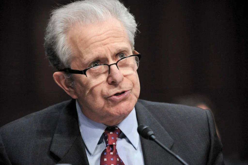 Laurence Tribe speaking into a microphone