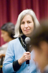 women talking into microphone
