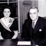black and white photo of a couple sitting together