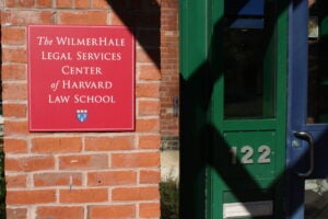 a sign on the side of the Legal Services Center building
