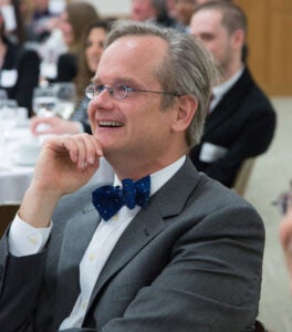 Lawrence Lessig smiling in the audience