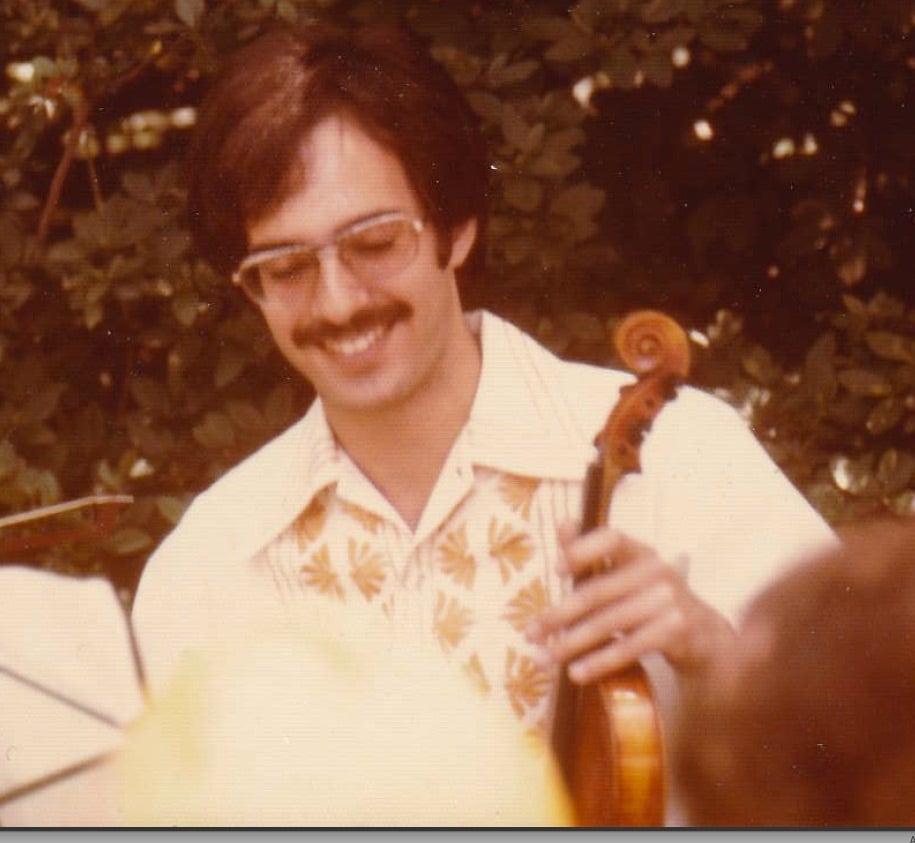 Singer in 1977, playing the processional at his brother's wedding.