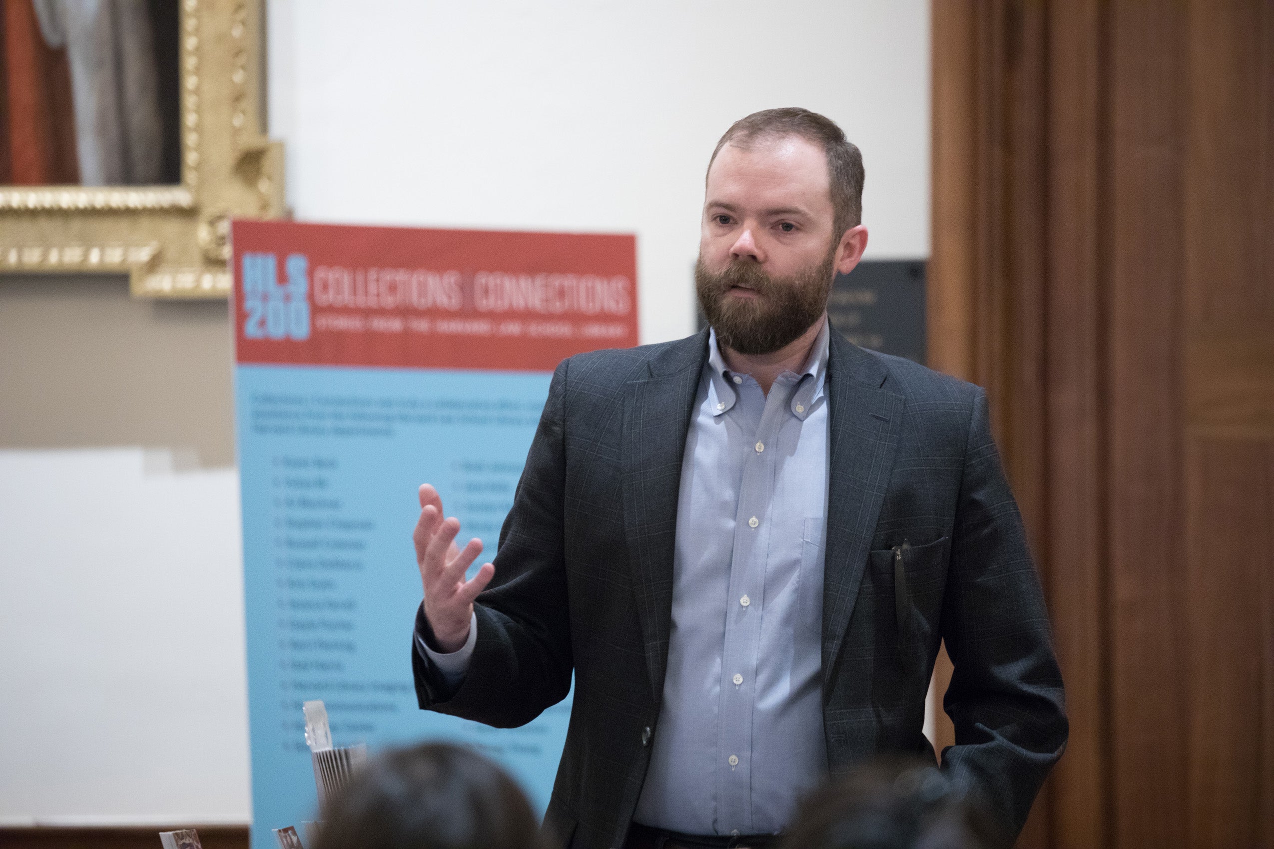 Phil Torey speaking in front of a group