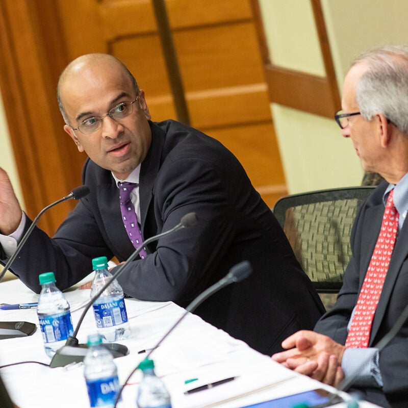 Guhan Subramanian chairing panel discussion