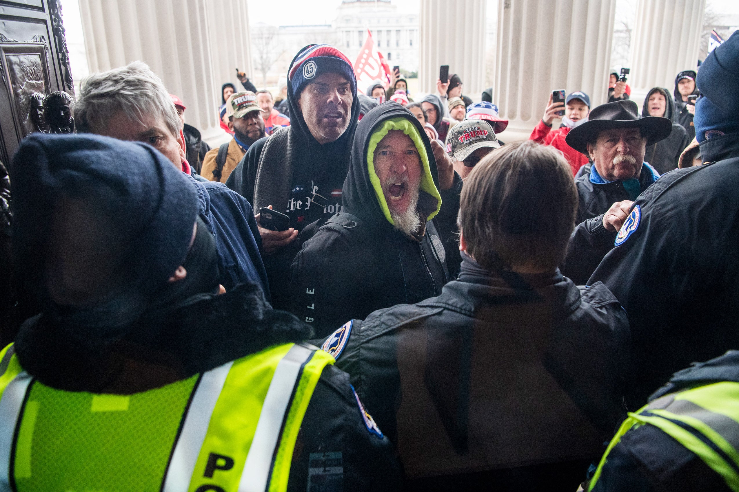Rioters attempt to enter the U.S. Capitol at the House steps during a joint session of Congress