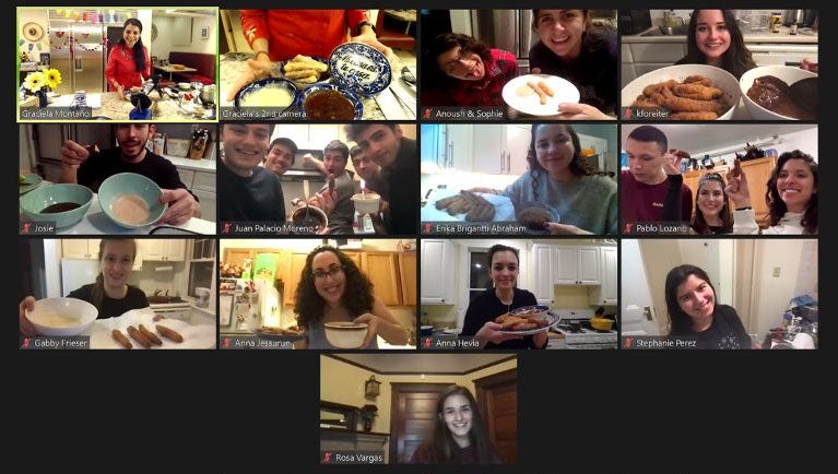 Screenshot of a group of students on Zoom, showing the churros they just made.