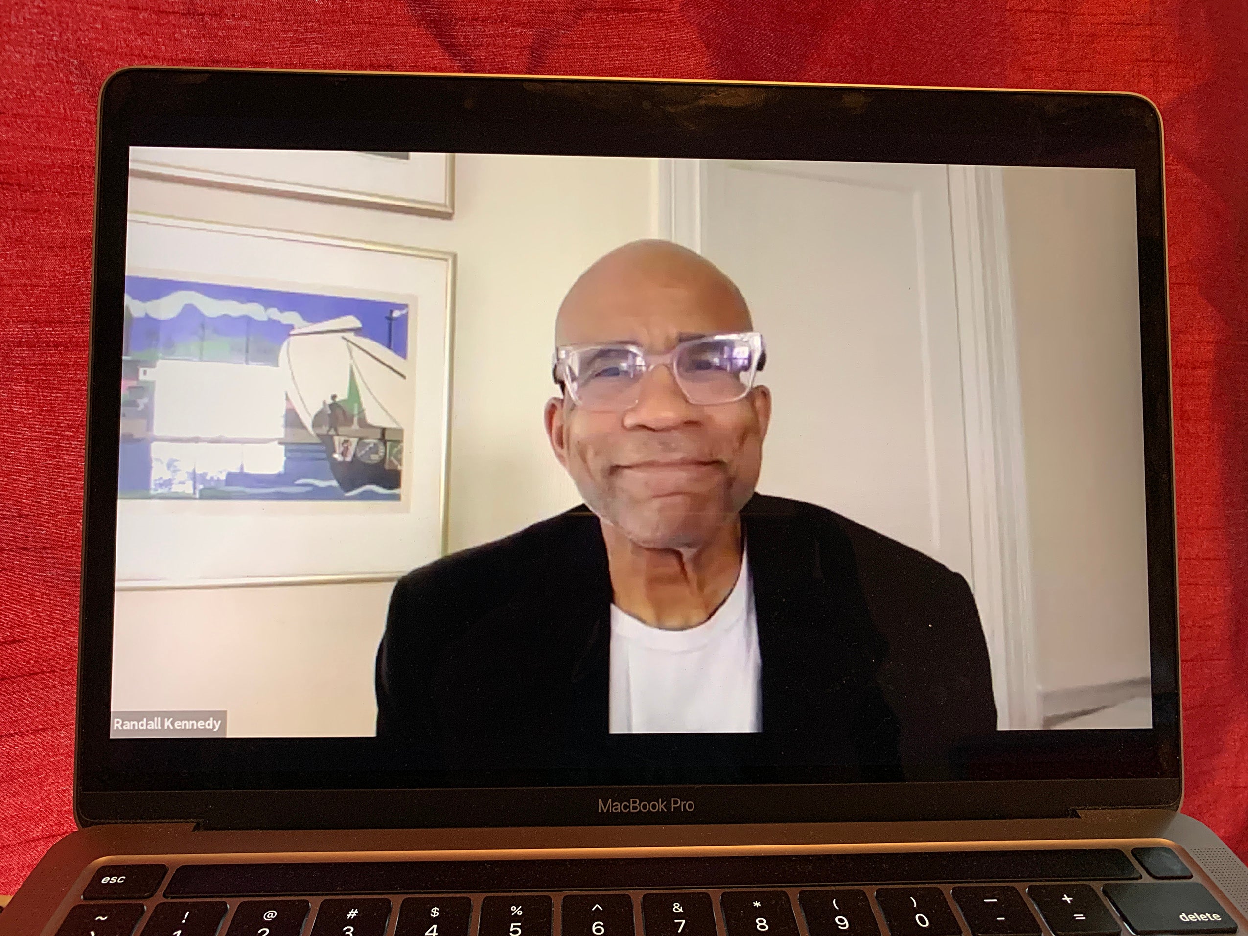 Randall Kennedy on a video call on a laptop