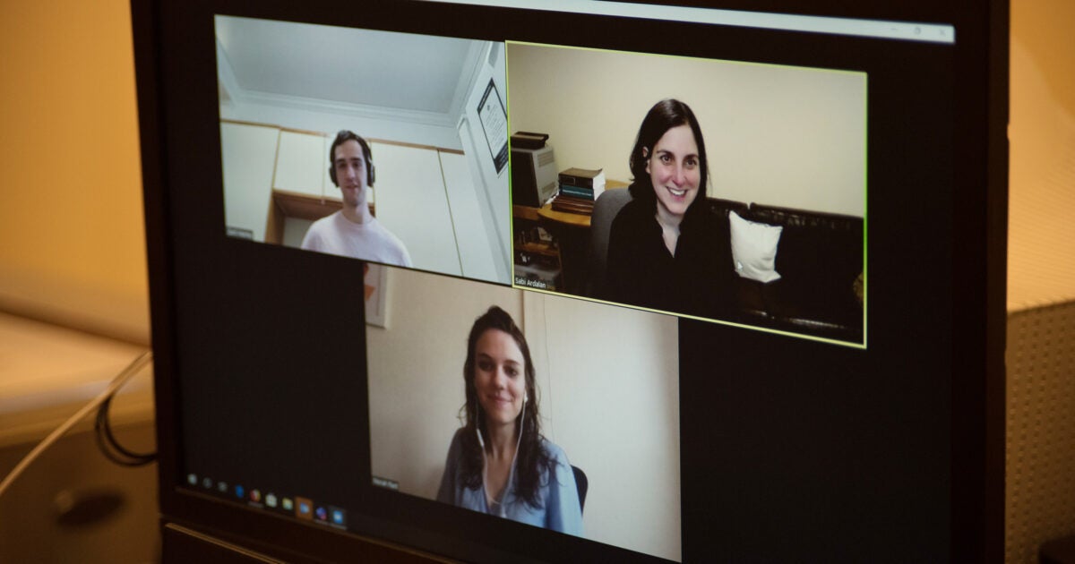 Screen shot of an online meeting with professor and a male and female student