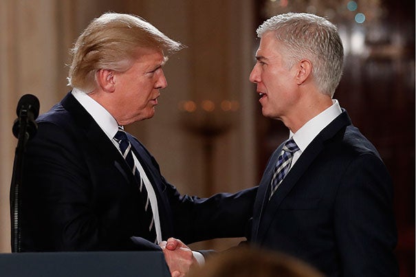 President Donald Trump shakes hands with 10th U.S. Circuit Court of Appeals Judge Neil Gorsuch, his choice for Supreme Court Justices in the East Room of the White House in Washington, Tuesday, Jan. 31, 2017.