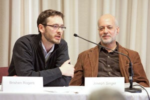 Brishen Rogers and Professor Joseph Singer speaking at a conference
