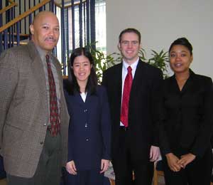 Price with students Hsieh, Barton and Molefe
