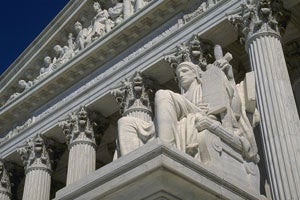 Supreme Court Contemplation of Justice statue