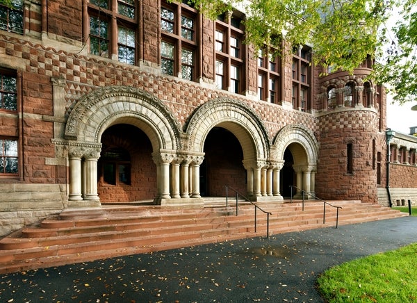 South entrance to Austin Hall featuring intricately carved stone arches