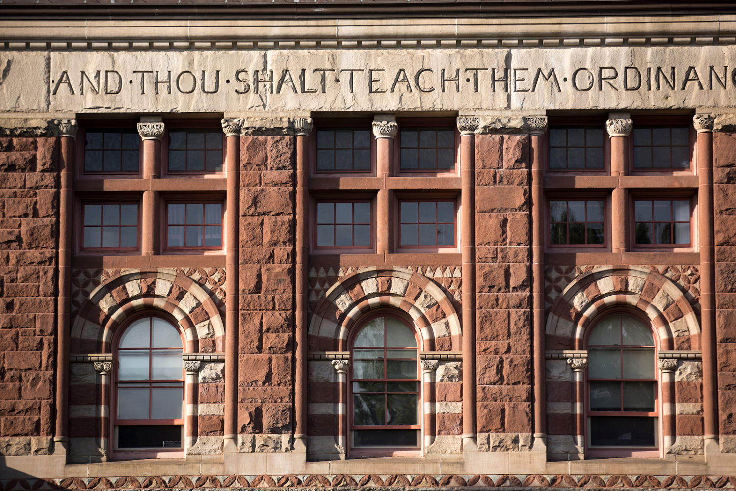Austin arched windows featuring decorative stone work