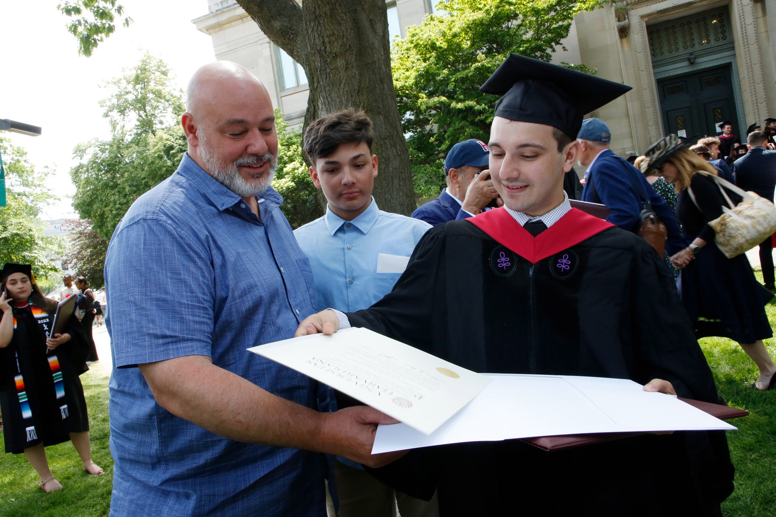 A father looks at his son's law degree