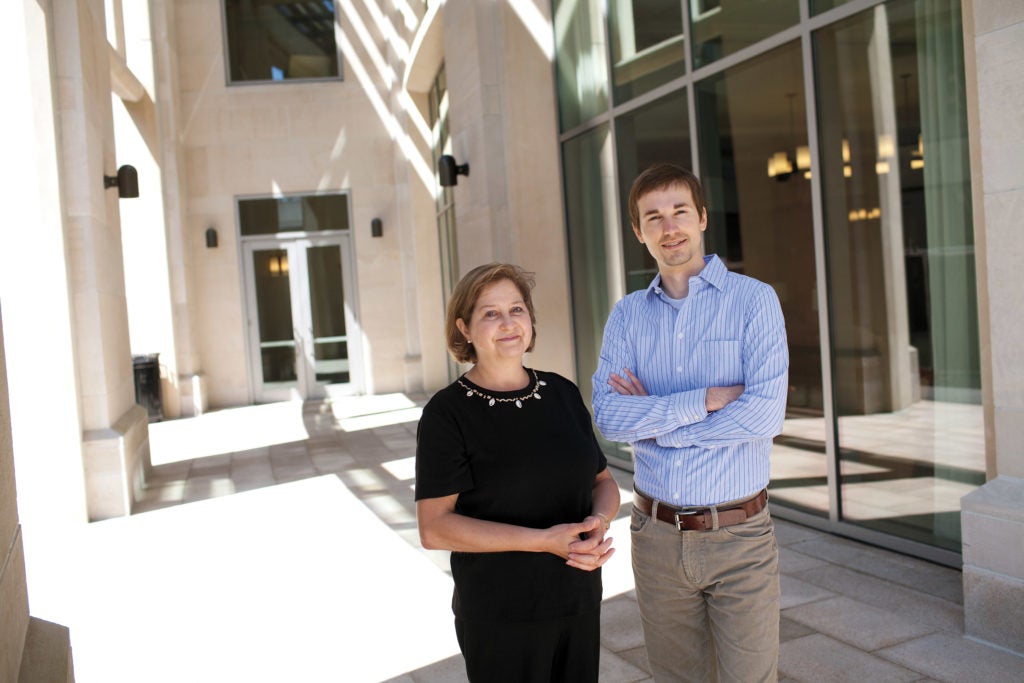 Wendy Jacobs and Chase Romney in front of the WCC