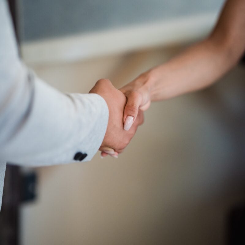 close up shot of a handshake