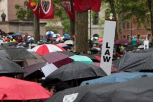 Umbrellas and 'law' sign at 2017 commencement