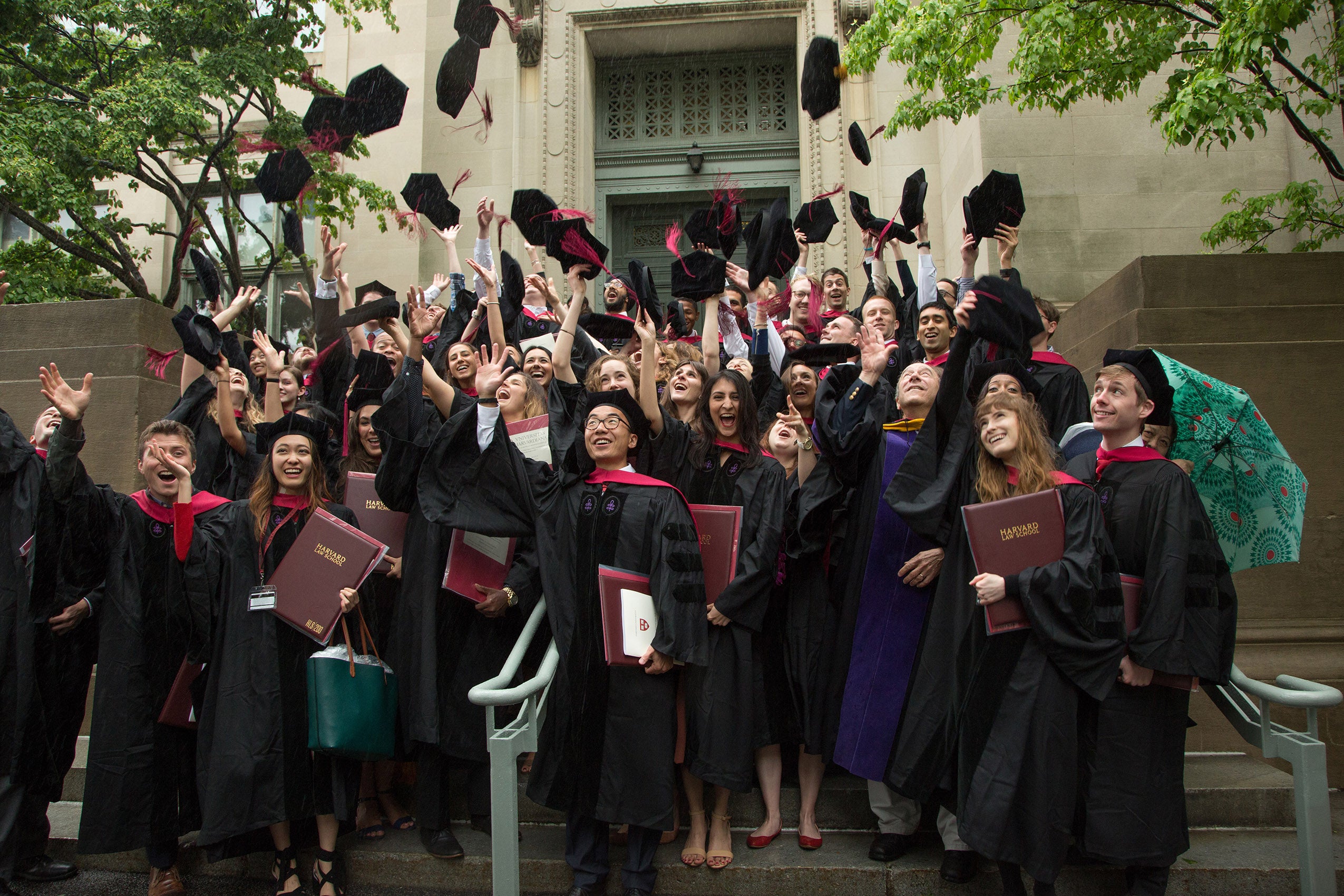 Students toss their caps at commencement 2017