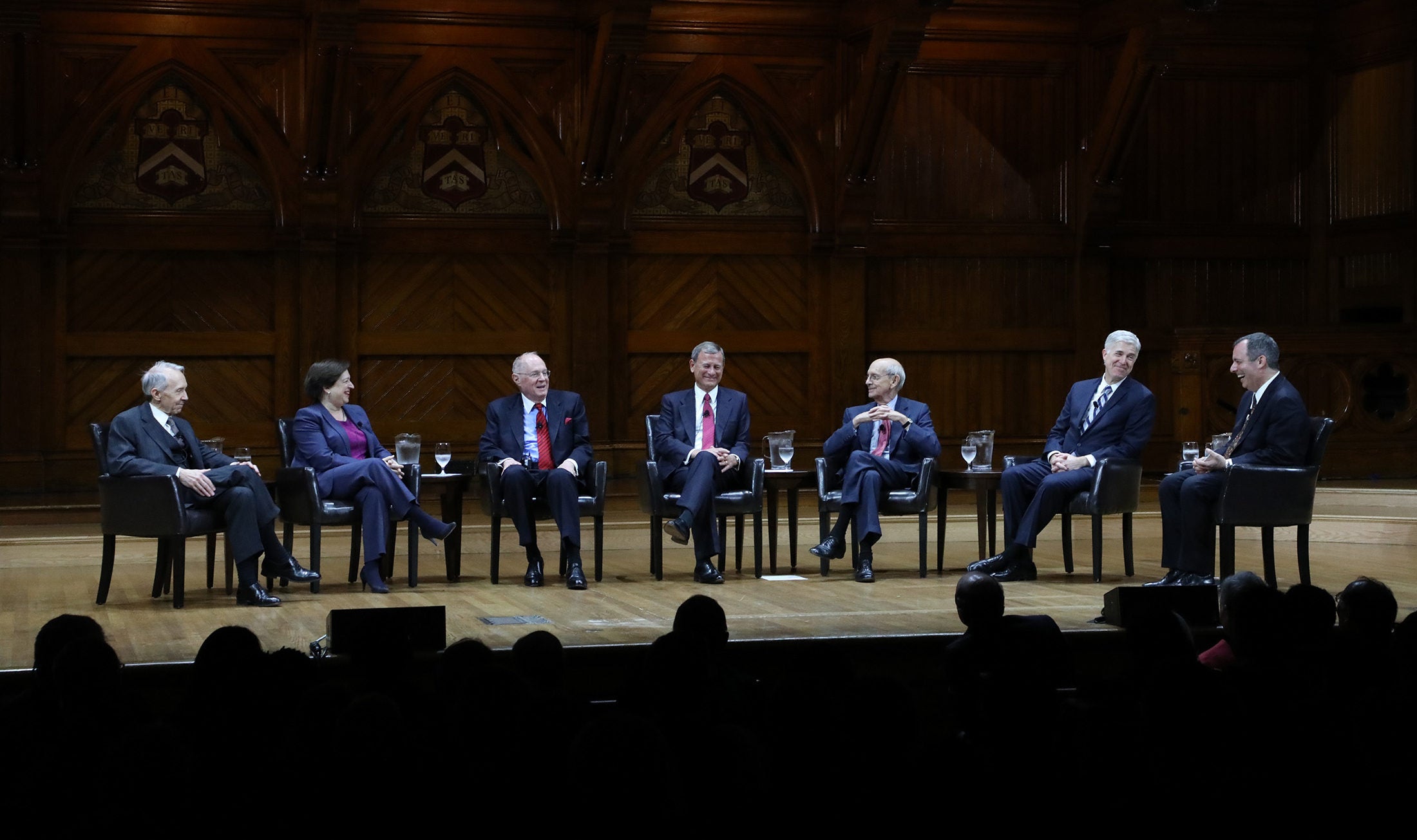Six Supreme Court Justices speaking to Dean John Manning