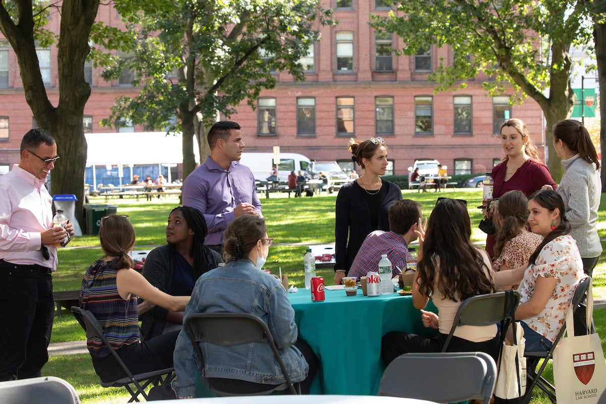 group of people talking around a table