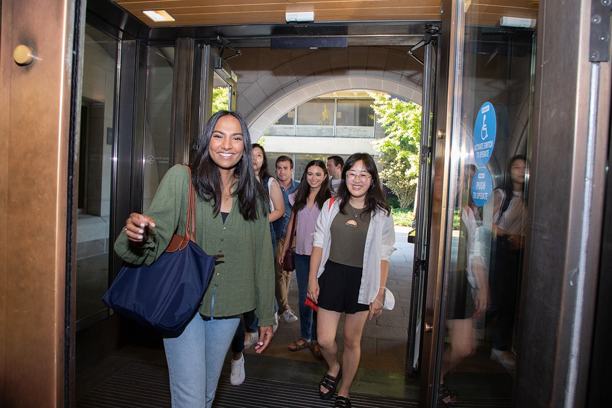 Students walking in the doors of the WCC for orientation