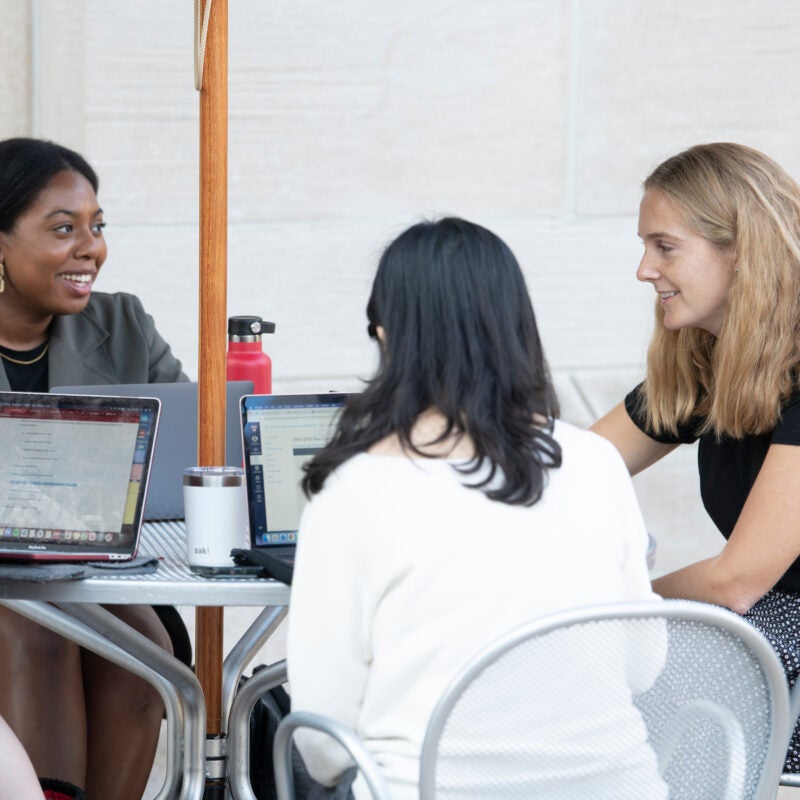 A group of students sitting around a table