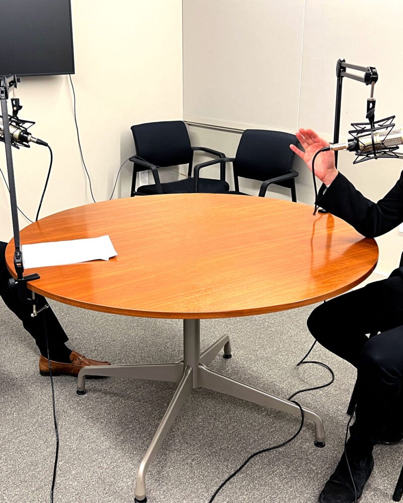 people talking with headphones on