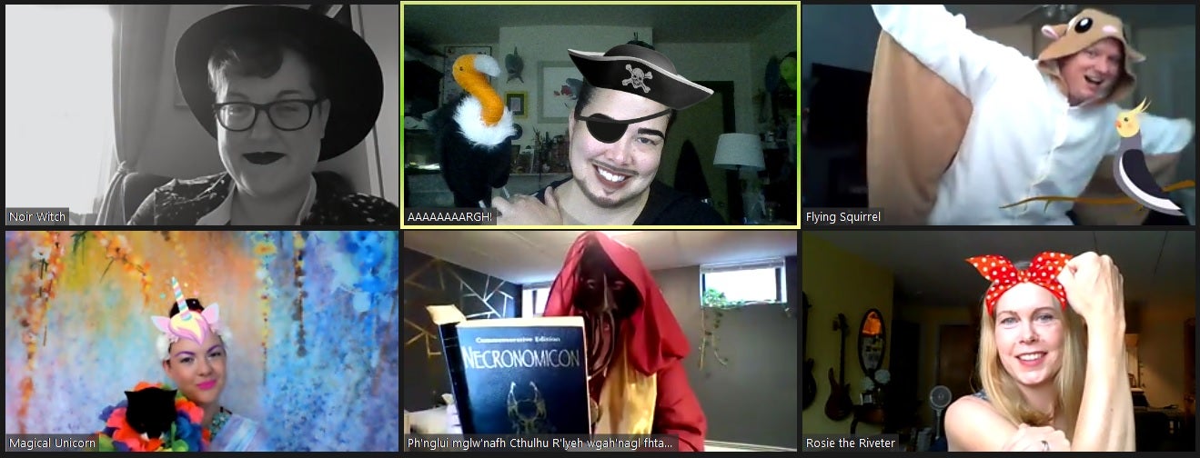 Screenshot of six people dressed in Halloween costumes.