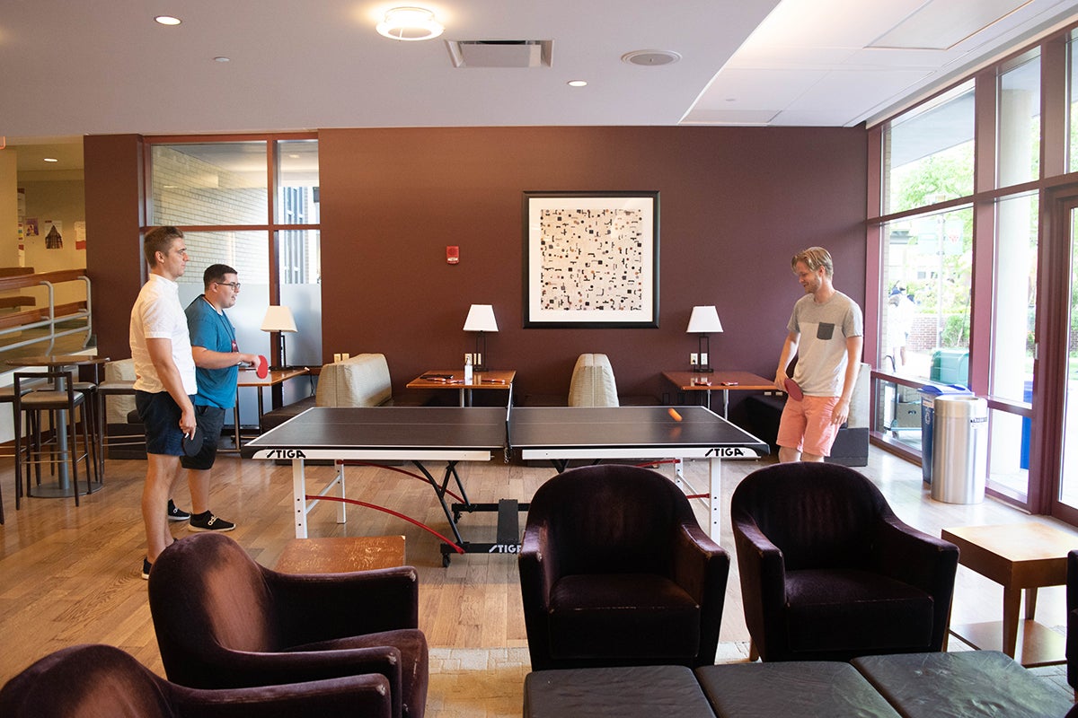 Students playing table tennis