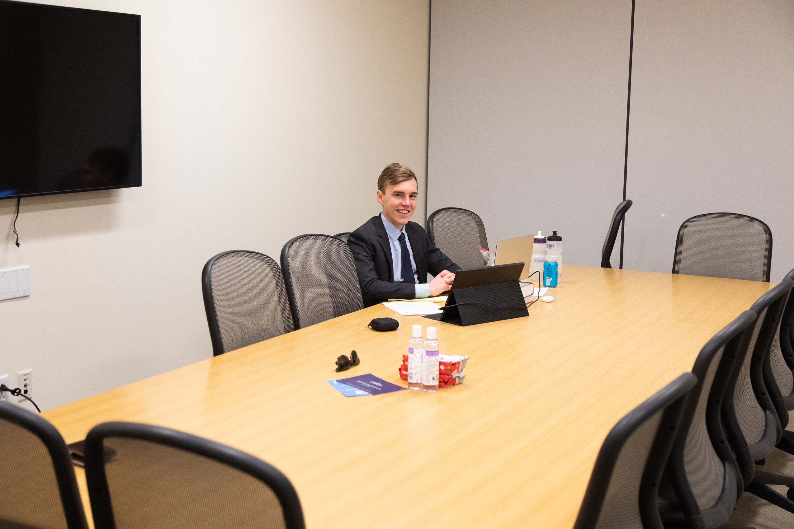 Travis Fife sitting at a table in HLS classroom