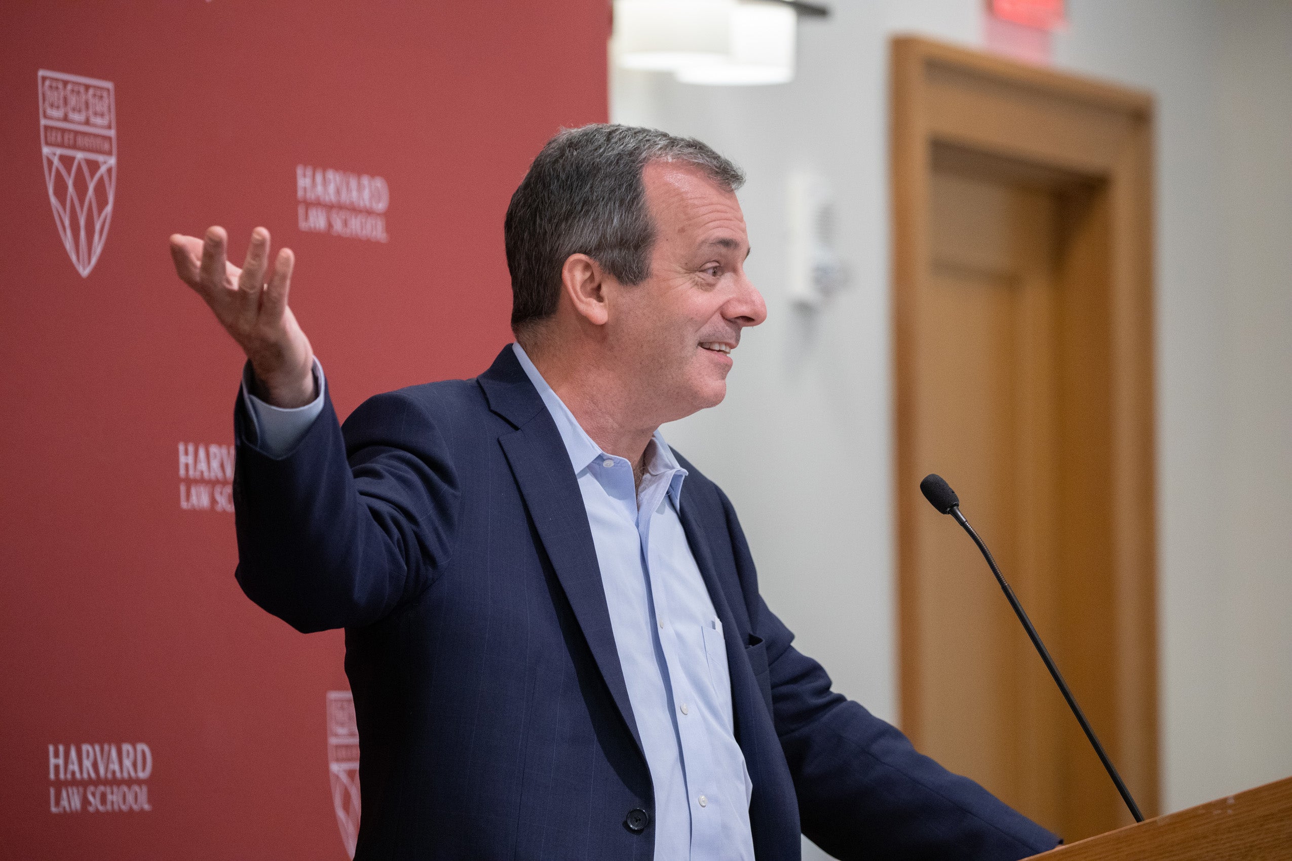Dean Manning speaking at a podium