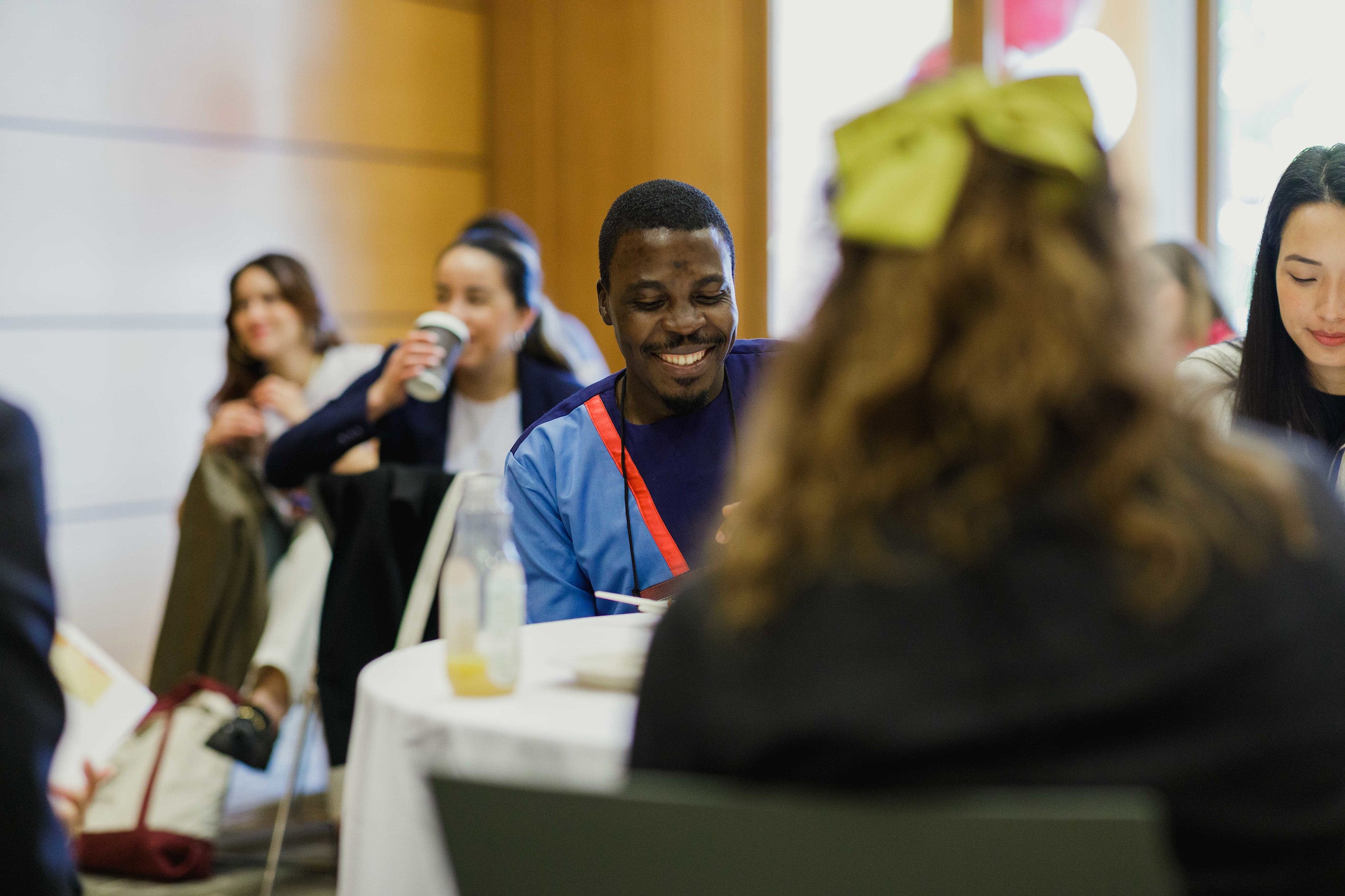 A man at a table with others
