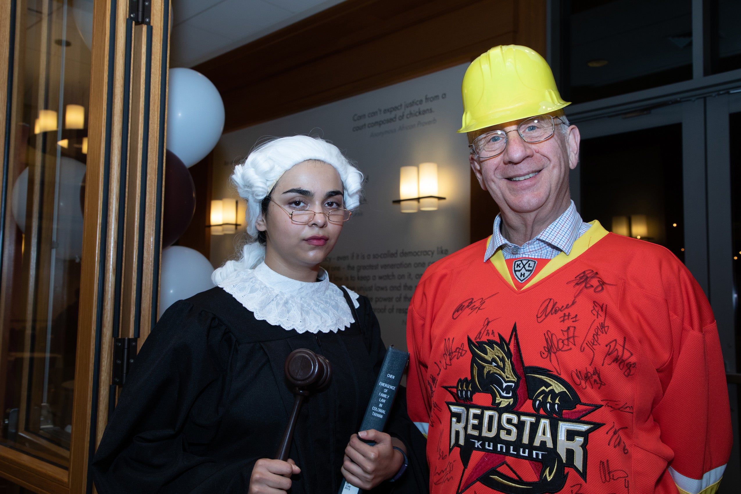 A man and woman in a Halloween outfit