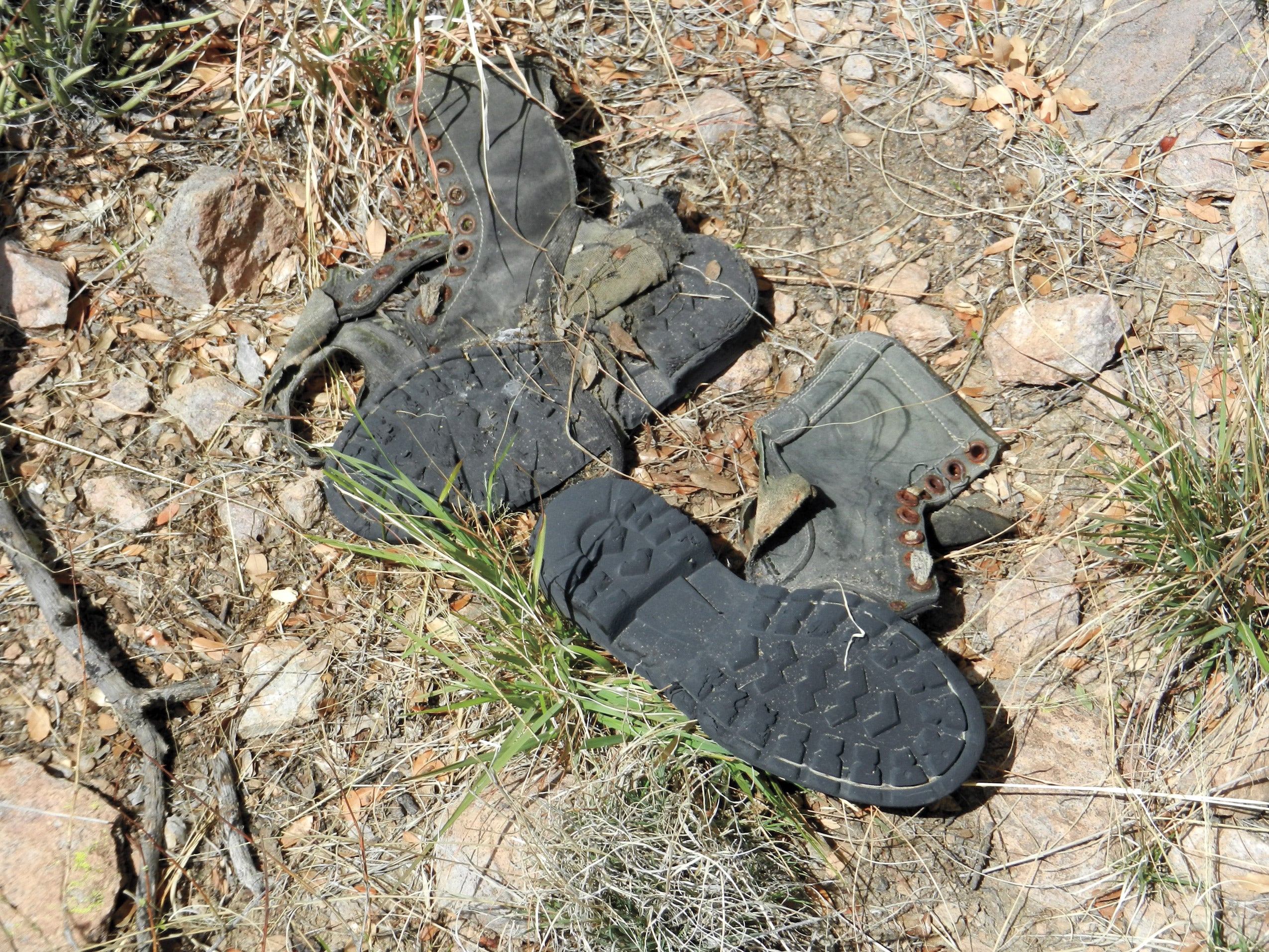 Abandoned shoes in the desert