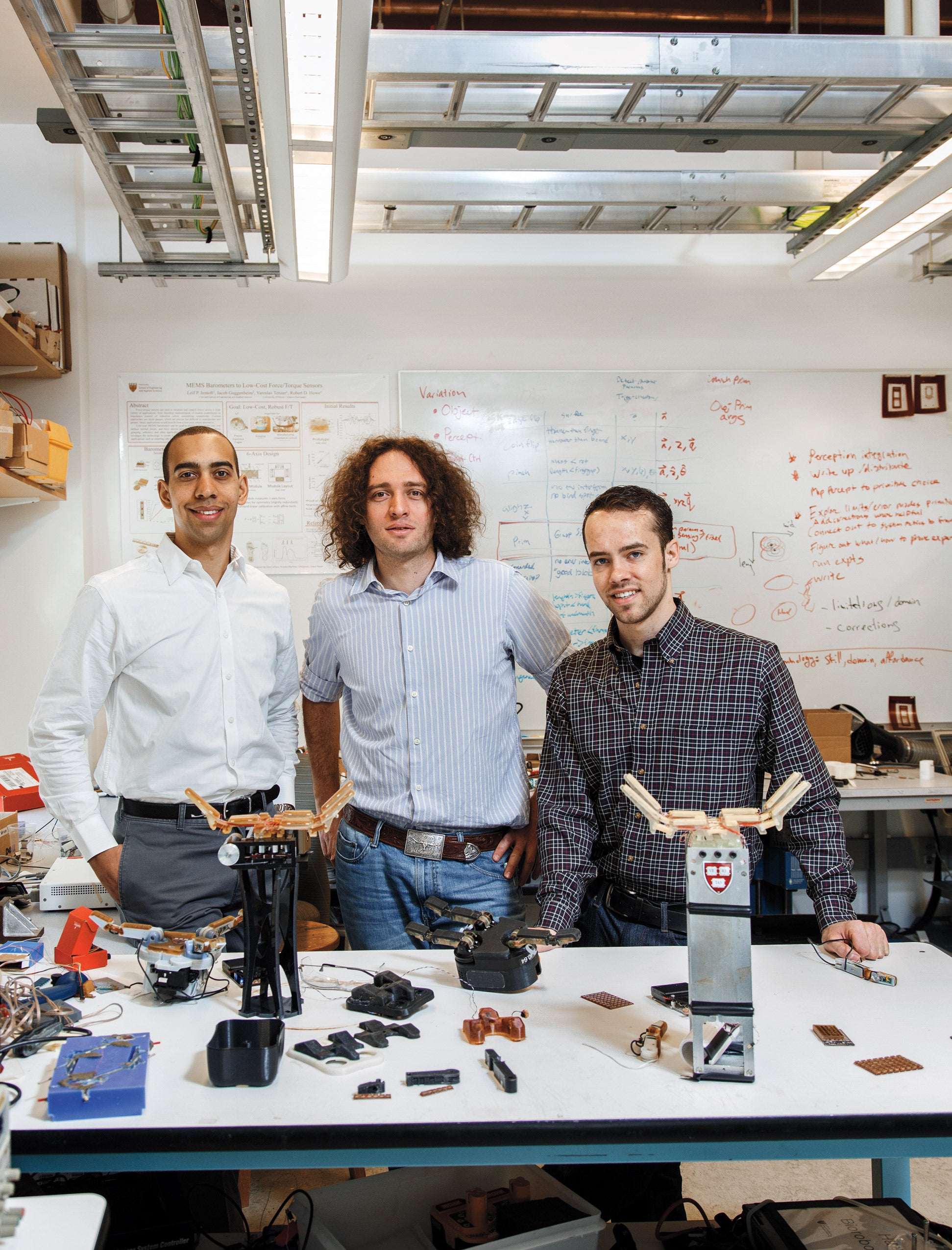 Student lawyer Lauren Gore ’15 and robotics researchers Yaroslav Tenzer and Leif Jentoft.