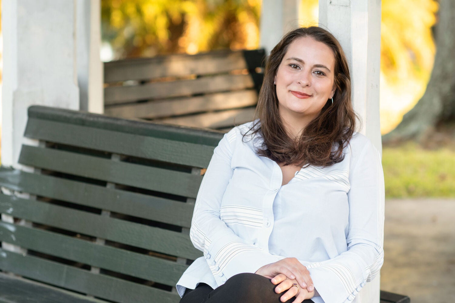 Portrait of a woman on a bench