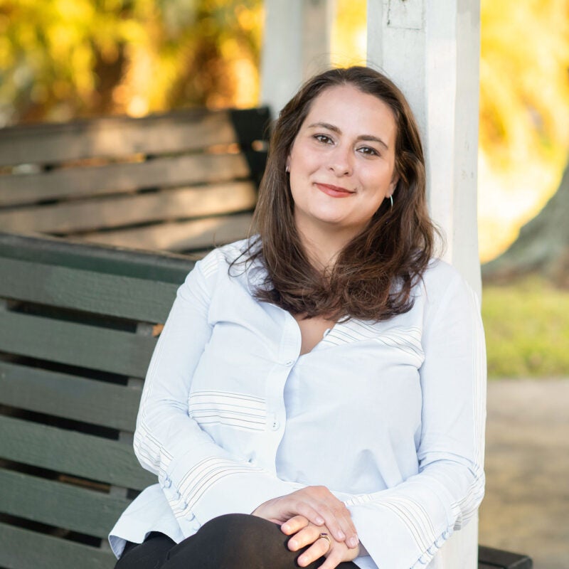 Portrait of a woman on a bench