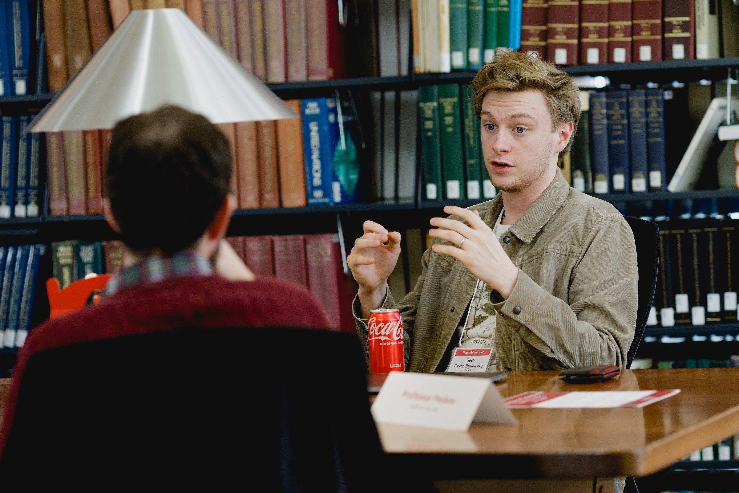 A student seeking advice from Ari Peskoe.