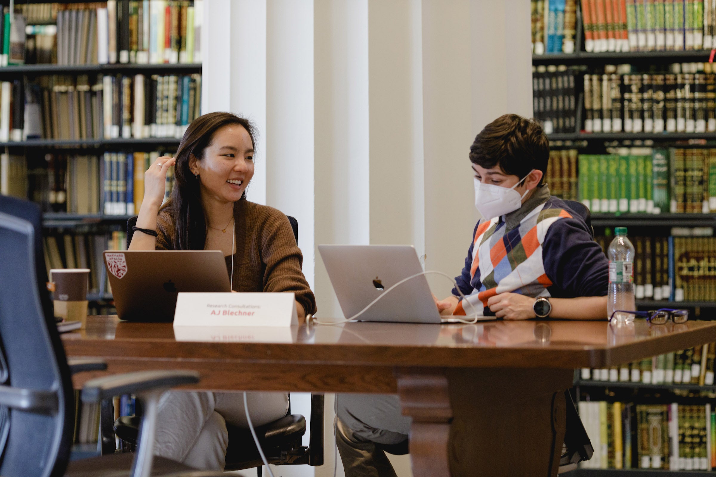 A.J. Blechner speaks with a student.