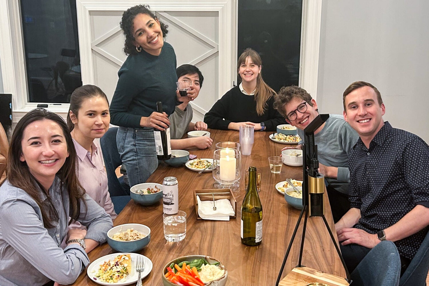 A group of students eating around a table