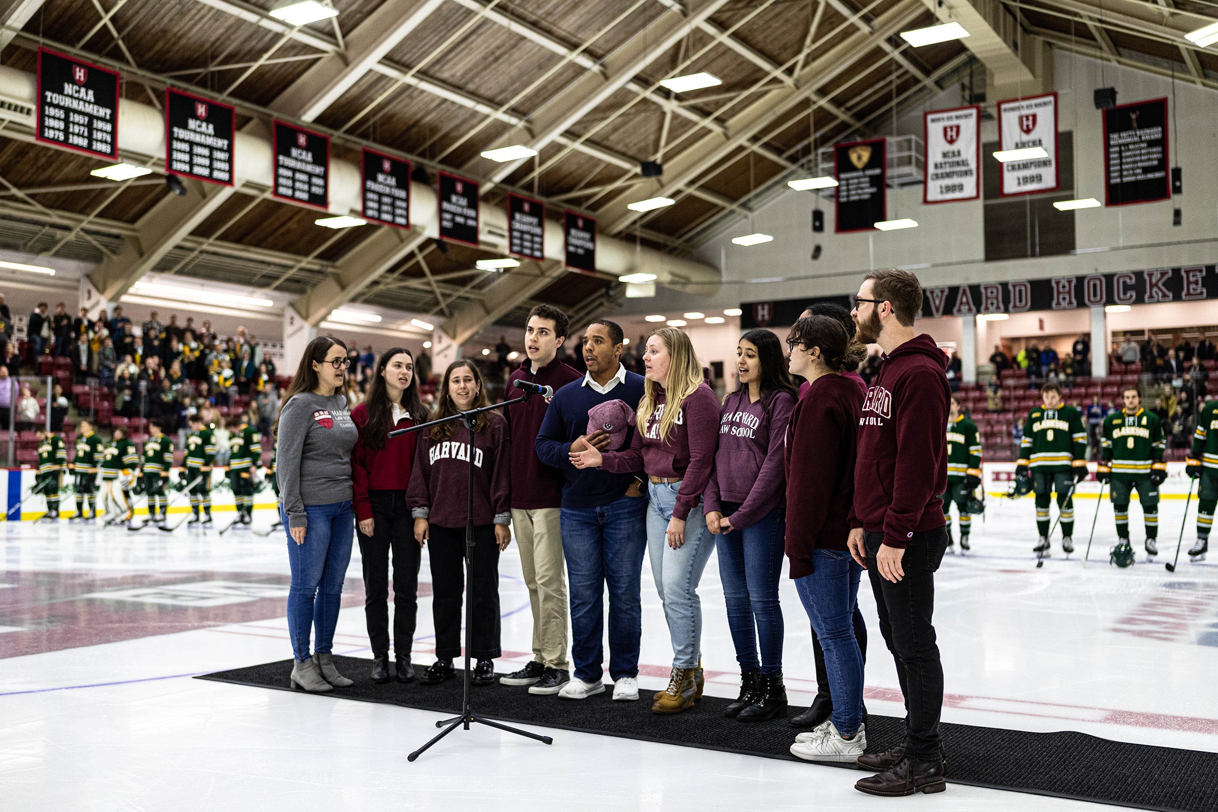 The Scales of Justice perform the National Anthem.