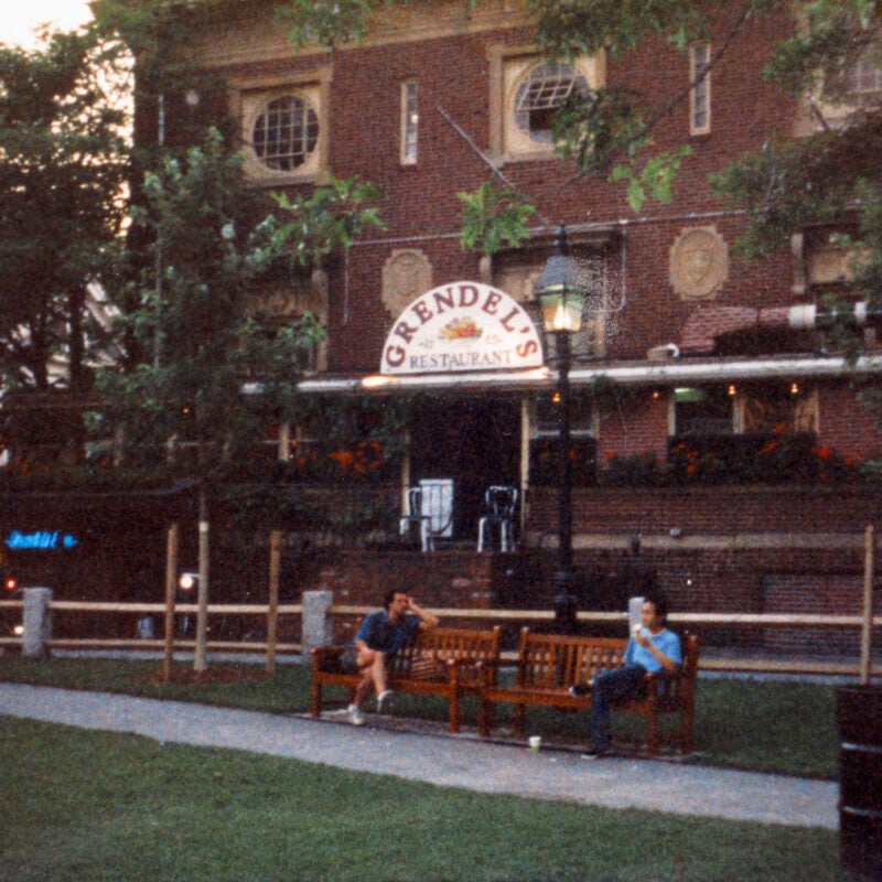 A photo of the front of a brick building with the sign Grendel's Den