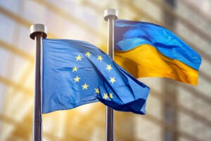 Flags of the European Union and Ukraine flying side by side.