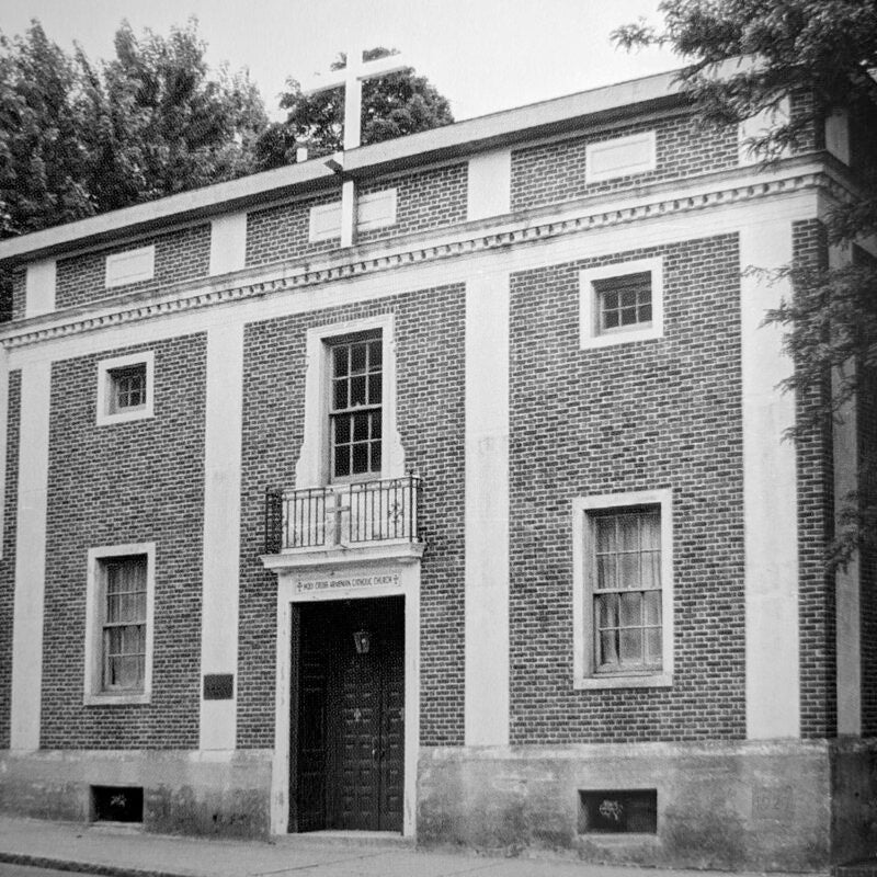 Black and white photo of a brick church