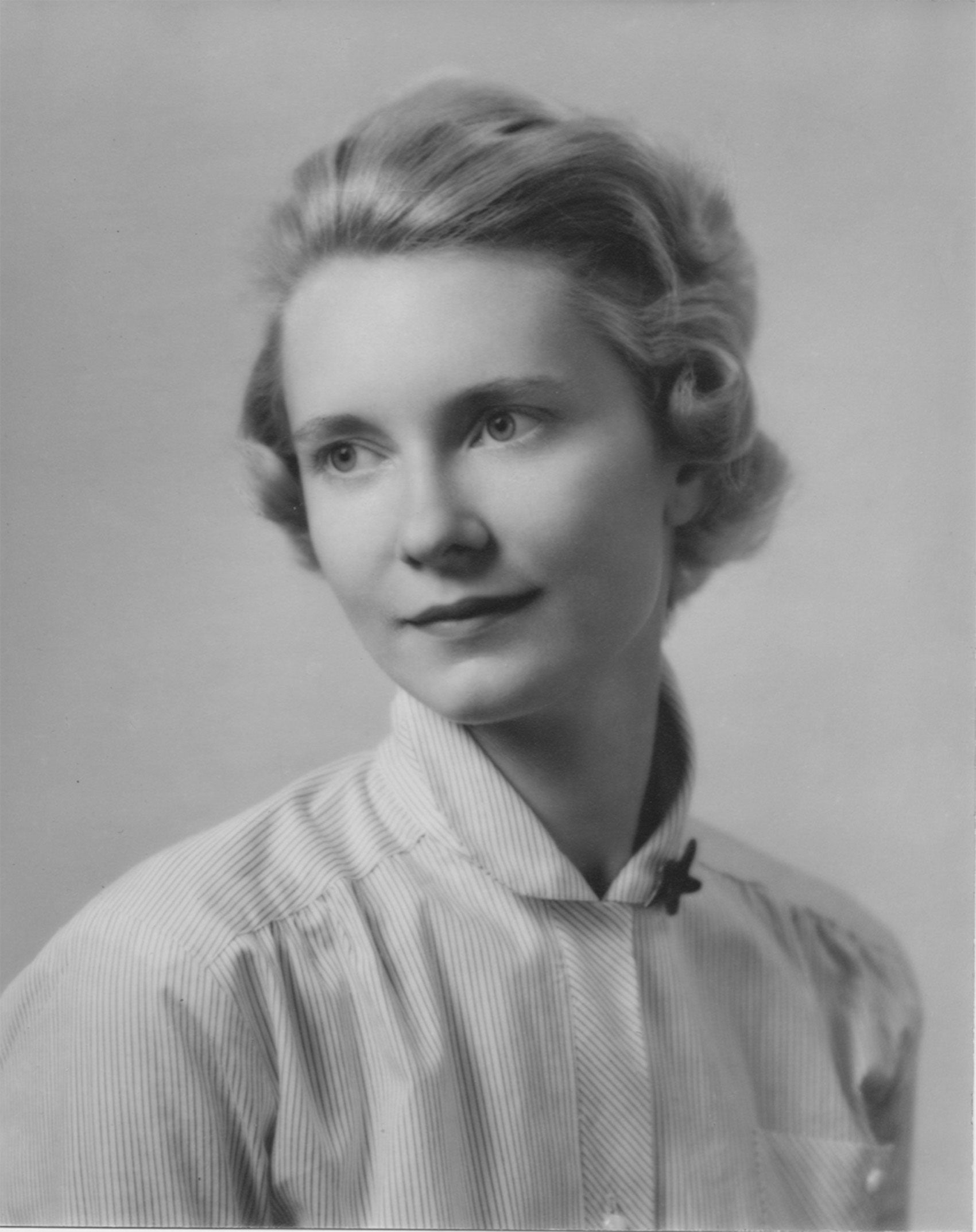 a black and white headshot of a woman