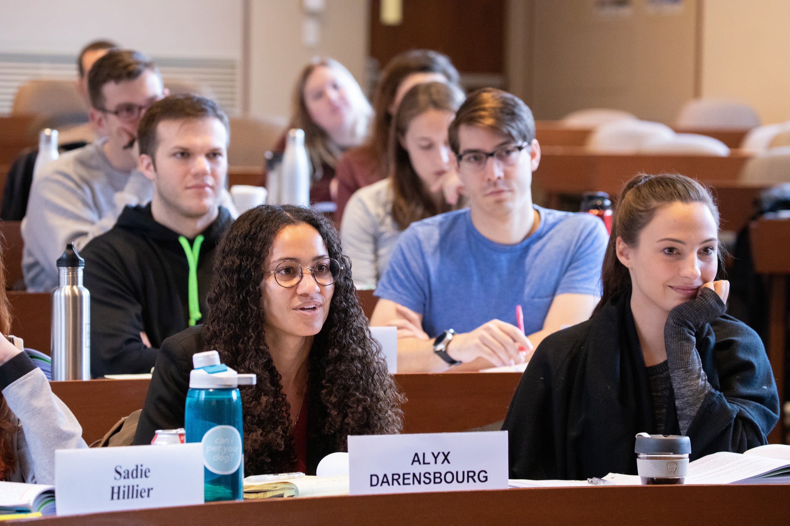 a tight shot of students sitting in a classroom two women in the front rows