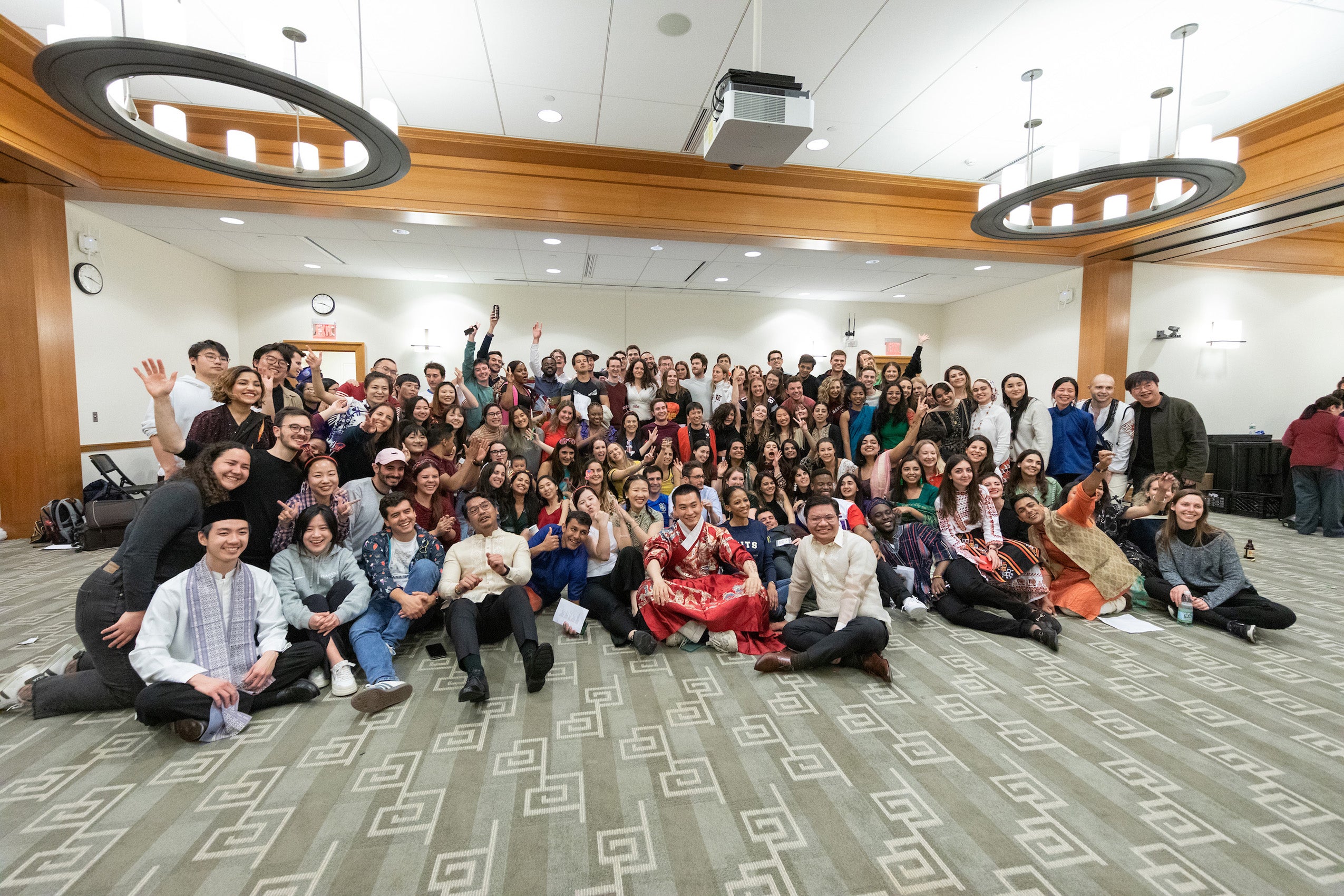 A large group people gather for a group photo