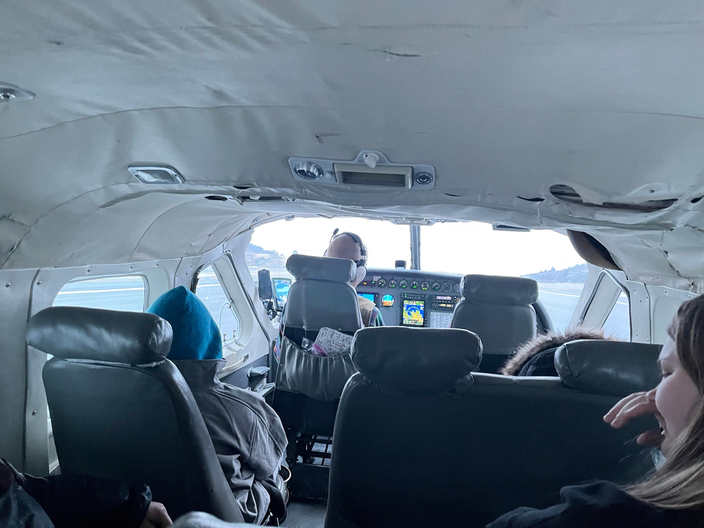 The inside of a small plane with only a few seats