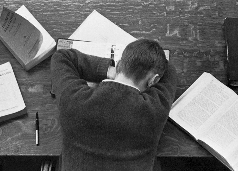 Student sleeping on desk.